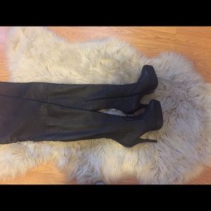 Leather black thigh boots
